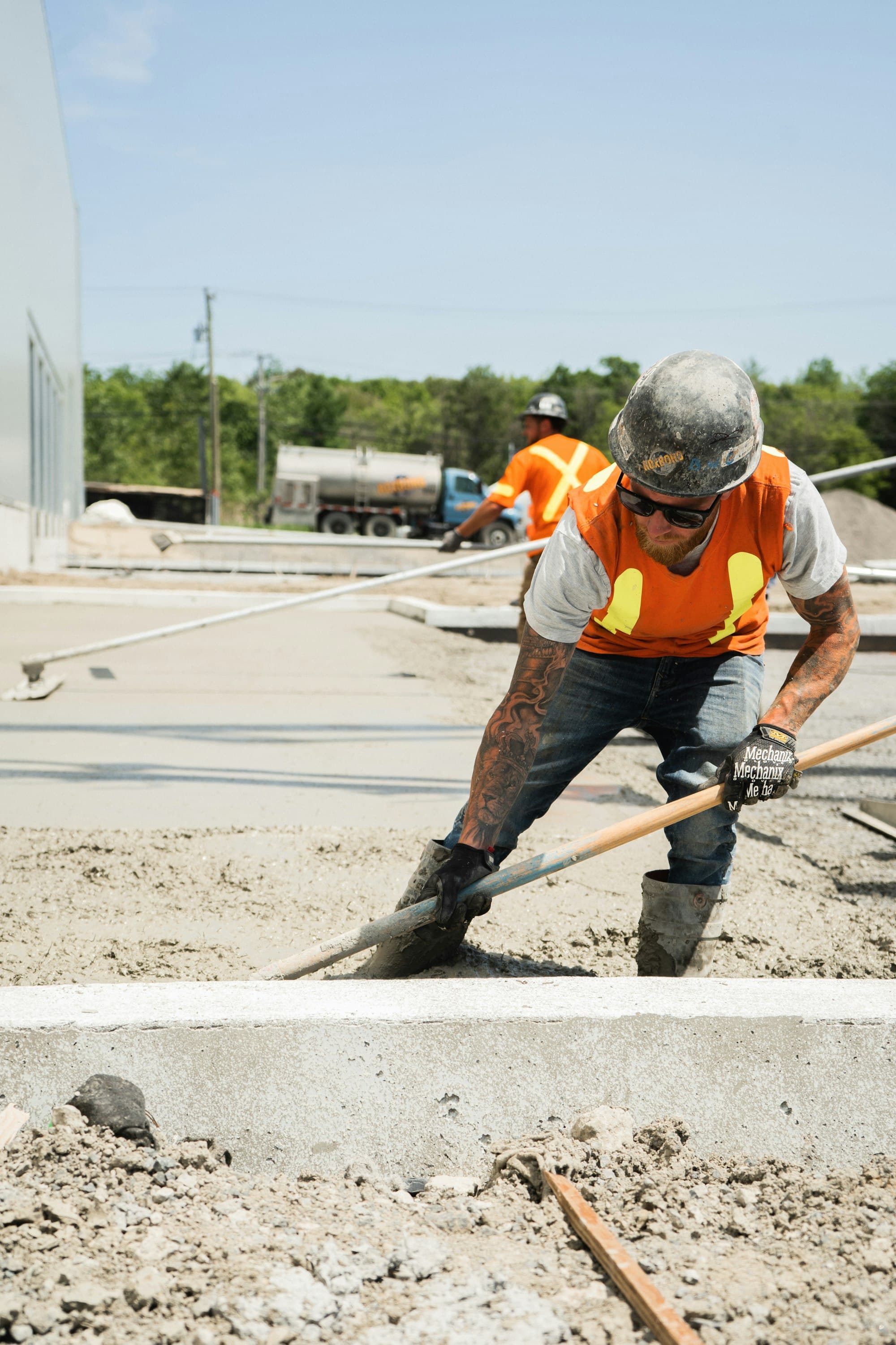 Worker in a safety vest on a construction site
